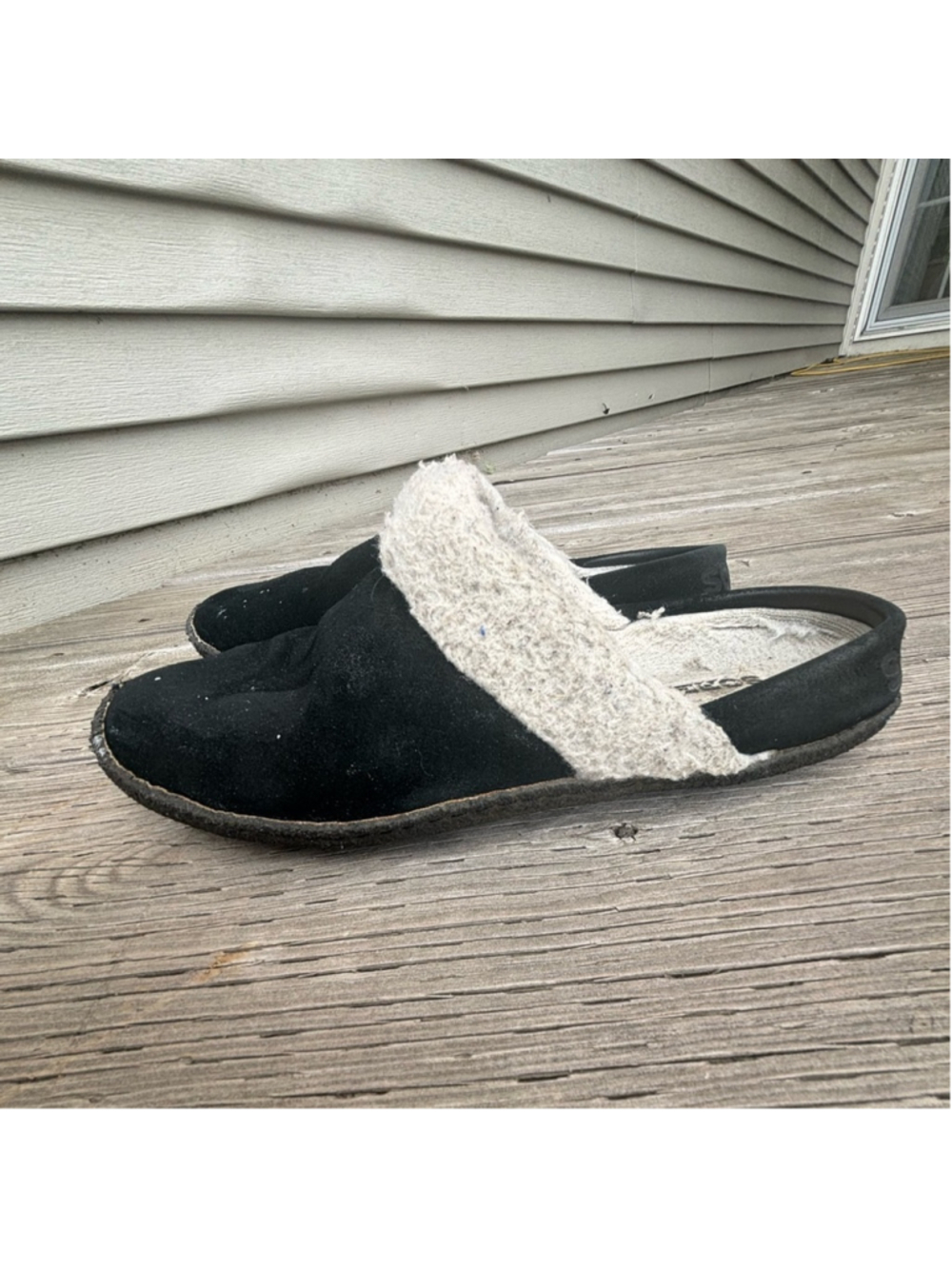 Sorel Black and Cream Slippers with Sleek Design